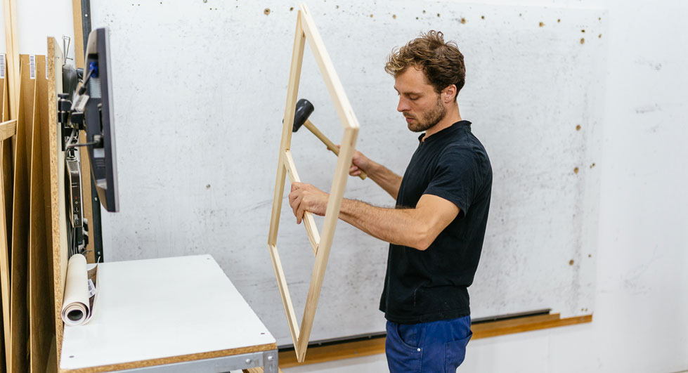 A stretcher frame is assembled