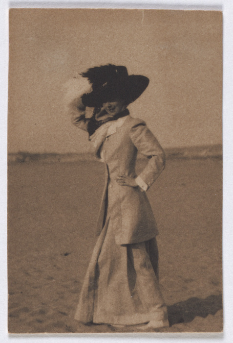 Young lady with big hat on the beach, de profil from Adolf DeMeyer
