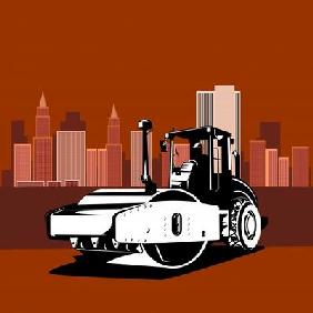 Road roller with buildings in the backgr