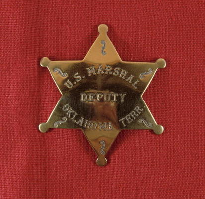 Badge of a US Deputy Marshal of Oklahoma Territory, c.1895 (brass) from American School, (19th century)
