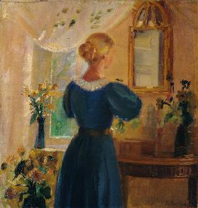 Woman in front of the mirror