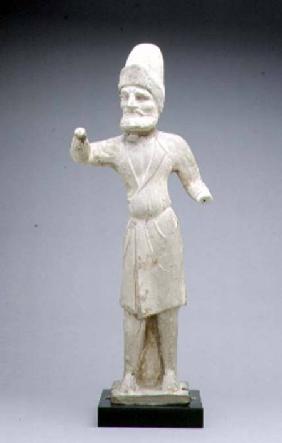 Tomb figure of a groom or merchant, Chinese,Tang Dynasty