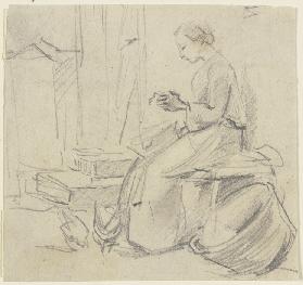 Sitting woman, seamstress