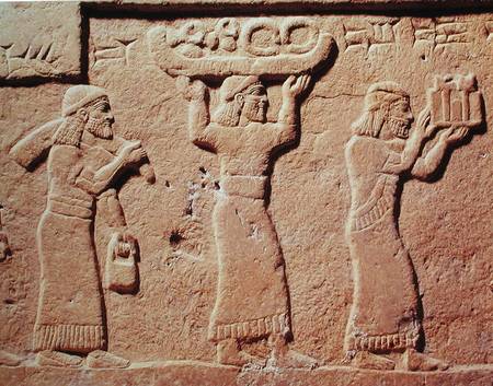 Relief depicting porters laden with gifts from Assyrian