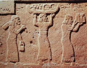 Relief depicting porters laden with gifts