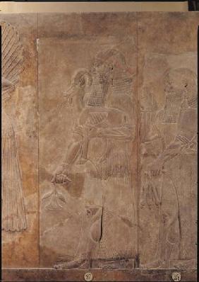 Relief depicting Sargon II (721-705 BC) or a priest carrying a sacrificial gazelle, from the Palace