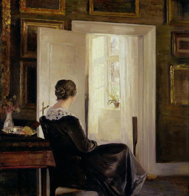 A woman seated near a door from Carl Holsoe