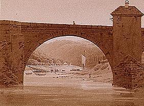 Riverside with stone bridge