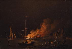 Ship on fire at night
