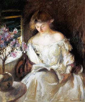 Reading young woman.