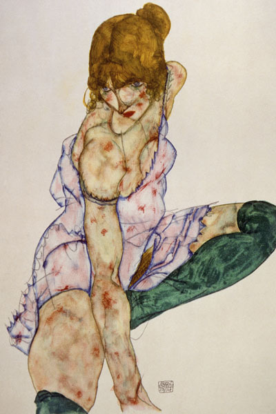 Fair-haired girl with green stockings from Egon Schiele