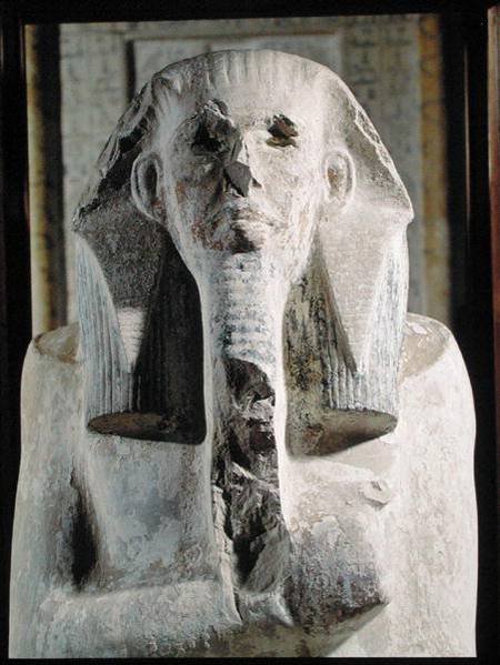 Seated statue of King Djoser (2630-2611 BC) from the Mortuary Temple beside the Step Pyramid of Djos from Egyptian