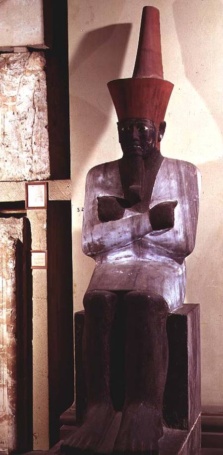 Statue of Mentuhotep II, enthroned and wearing the red crown of Lower Egypt, taken from the Mortuary from Egyptian