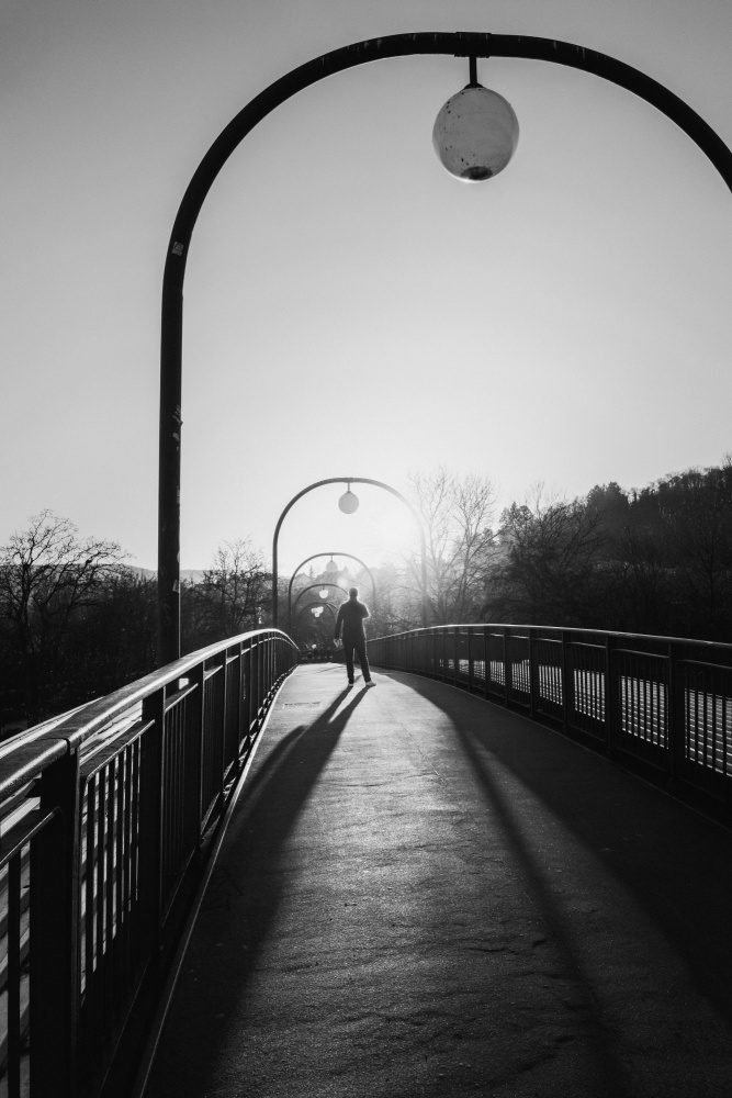 Man in backlight on a bridge from Eiji Yamamoto