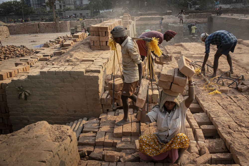hard work at a brickyard, Kolkata from Elena Molina