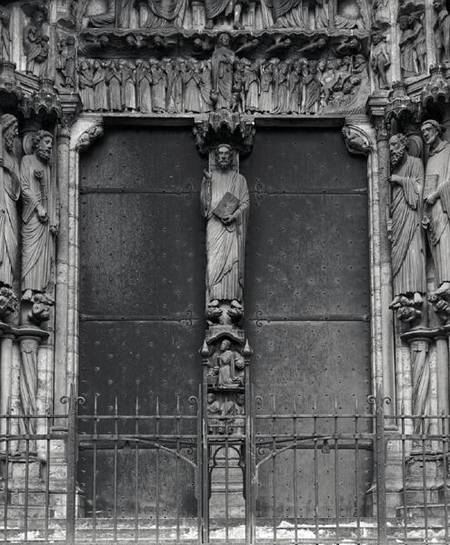 Beau Christ figure on the trumeau of the south portal from French School