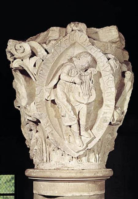 Capital depicting the Third Key of Plainsong with a lute player from French School