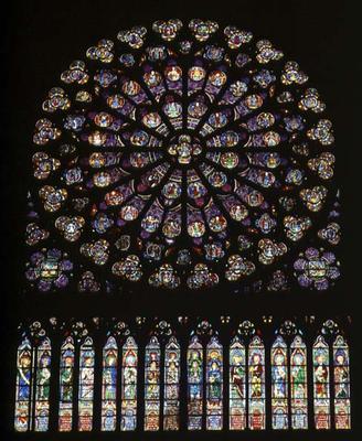 South transept rose window depicting Christ in the centre surrounded by saints and the twelve apostl from French School, (13th century)