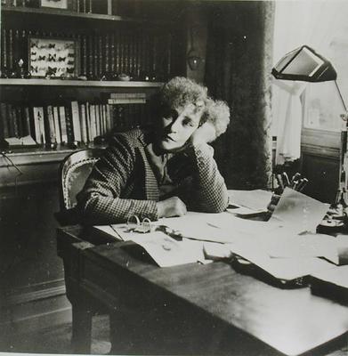 Portrait of Sidonie Gabrielle Colette (1873-1954), in her study (b