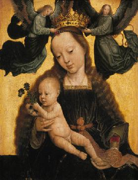 The virgin with the child is crowned by angels.
