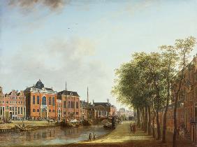 View of the Kloveniersburgwal in Amsterdam, with the Waag, and barge moored in the front of Trippenh