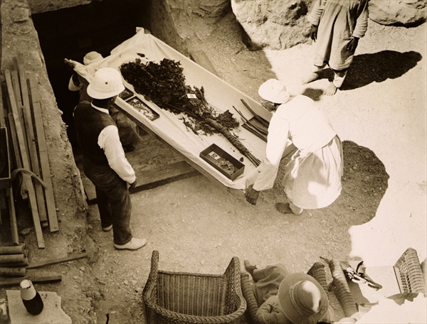 Funeral bouquet being removed from the Tomb of Tutankhamun, Valley of the Kings, 1922 (gelatin silve from Harry Burton