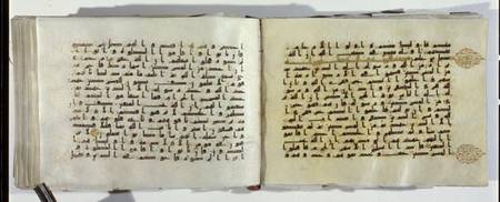 Two pages of a Koran manuscript written in Oriental Kufic script from Islamic School