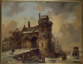 Wintry riverside at an old town gate