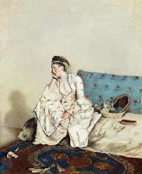 Lady with oriental dress on a Divan