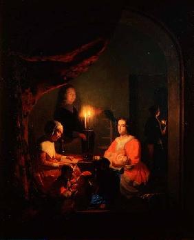 A Family in a Candlelit Interior
