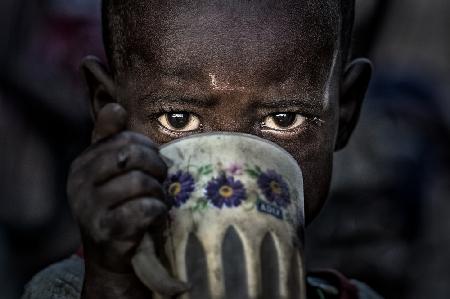 Samburu tribe child drinking water - Kenya