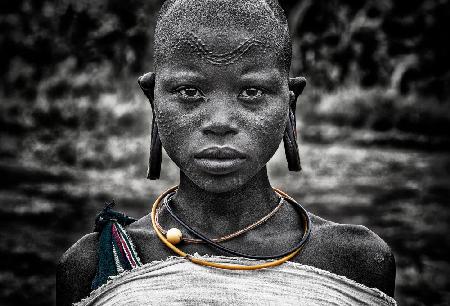 Surmi tribe girl.