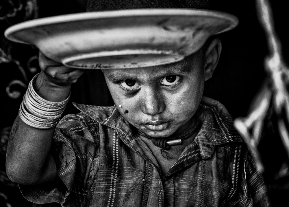 Sad Rohingya refugee child showing me his empty plate of food. from Joxe Inazio Kuesta Garmendia