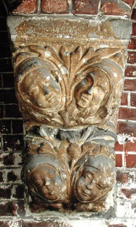 Carved capital depicting four faces, from the south portal from Netherlandish School