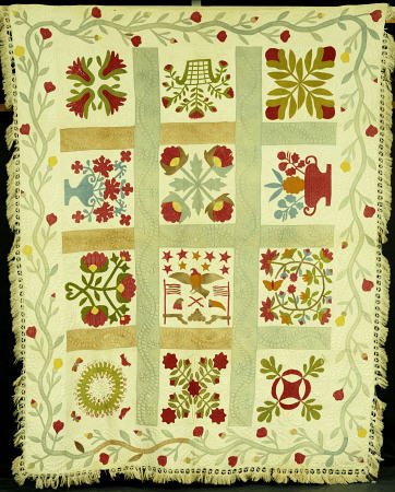 An Appliqued And Stuffed Cotton Quilted Coverlet from 