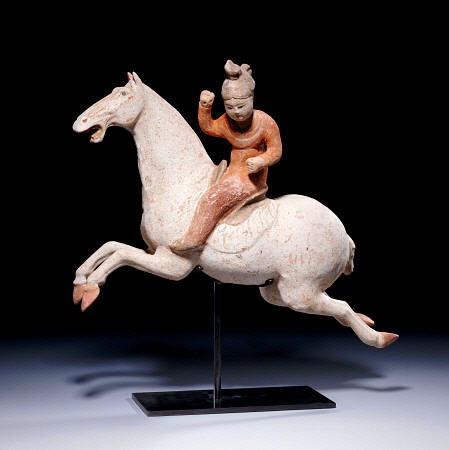 A Painted Red Pottery Female Polo Player Astride A Galloping Pony from 