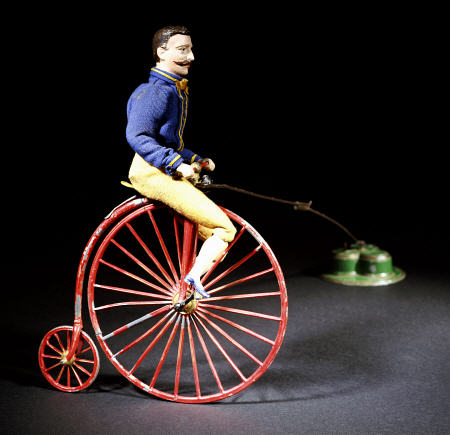 A Rare Clockwork  ''Blondin'' Cyclist -Painted Lead Figure, from 