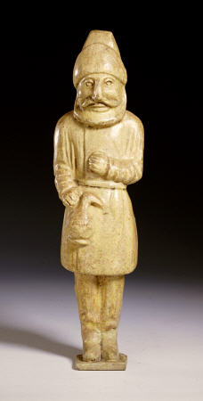 A Rare Straw-Glazed Figure Of A Semitic Wine Merchant from 