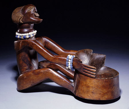 A Songye Female Bowl Bearer Carving from 