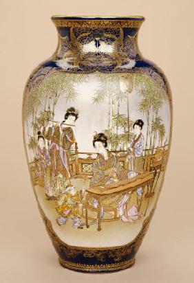 A Large Kinkozan Vase Depicting A Lady Playing A Koto With Ladies And Children Beneath A Wisteria