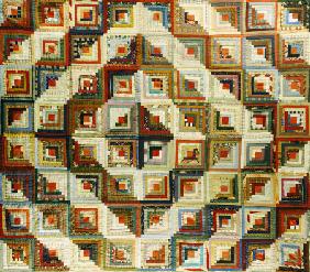 An Amish Pieced & Quilted Cotton Coverlet Worked In A Variation Of The Log Cabin Pattern