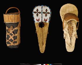 An Apache Willow Cradleboard, A Sioux Beaded Hide Cradleboard And A Plains Willow And Hide Cradleboa