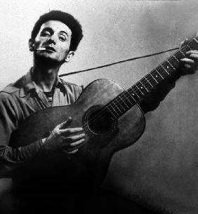 Musician Woody Guthrie considered as the father of folk music