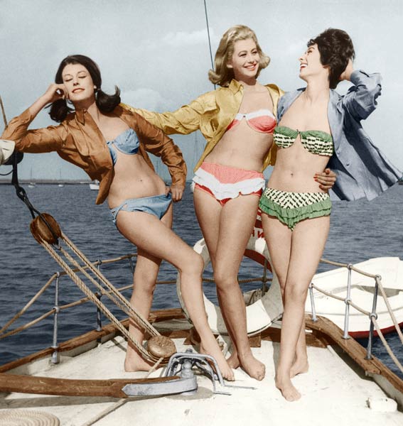 Three young women wearing bikinis colourized document from 
