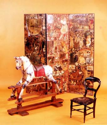 Victorian Nursery furnishings. Late 19th century rocking horse, mid-19th century scrapwork screen an from 