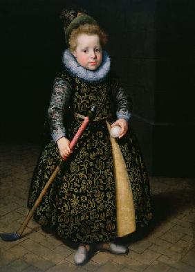 Portrait of a four-year old boy with club and ball