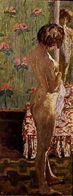 Act of a woman in front of flowered wallpaper from Pierre Bonnard