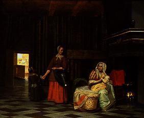 Woman with child at the chest and service maid.