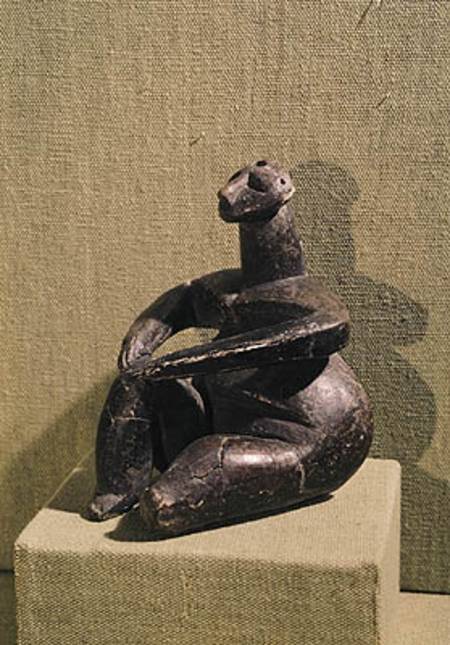 Seated female figure from Prehistoric