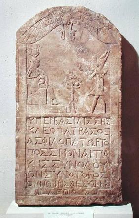 Stele dedicated to Isis depicting Cleopatra VII (69-30 BC) making an offering to Isis breastfeeding